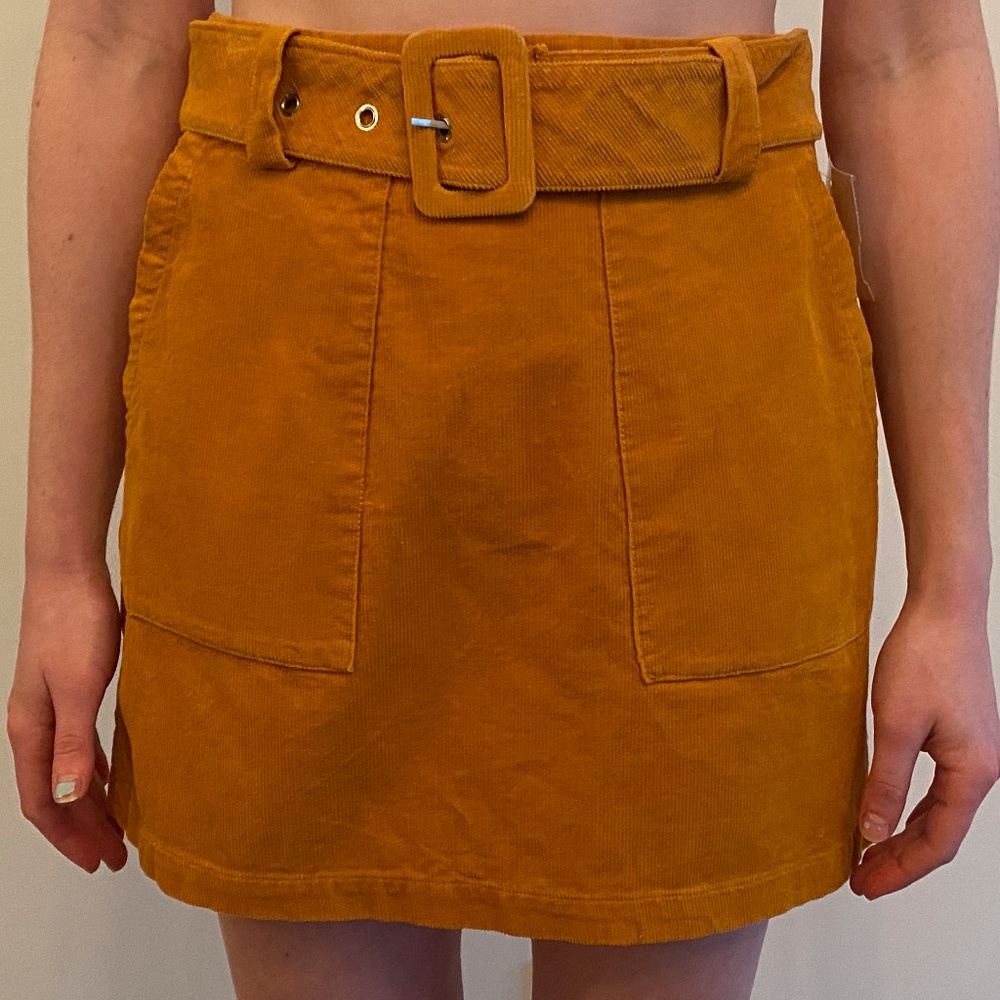 Skirt with belt buckle